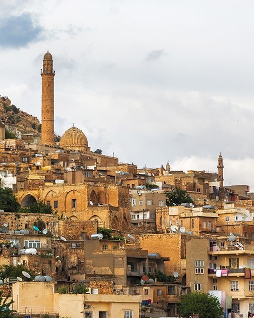 wide shot of Middle Eastern architecture on a hill