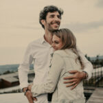 Young married couple hugging