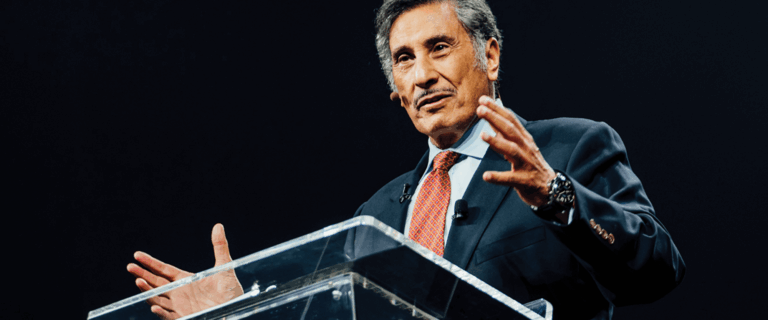 Dr. Michael A. Youssef speaking on stage