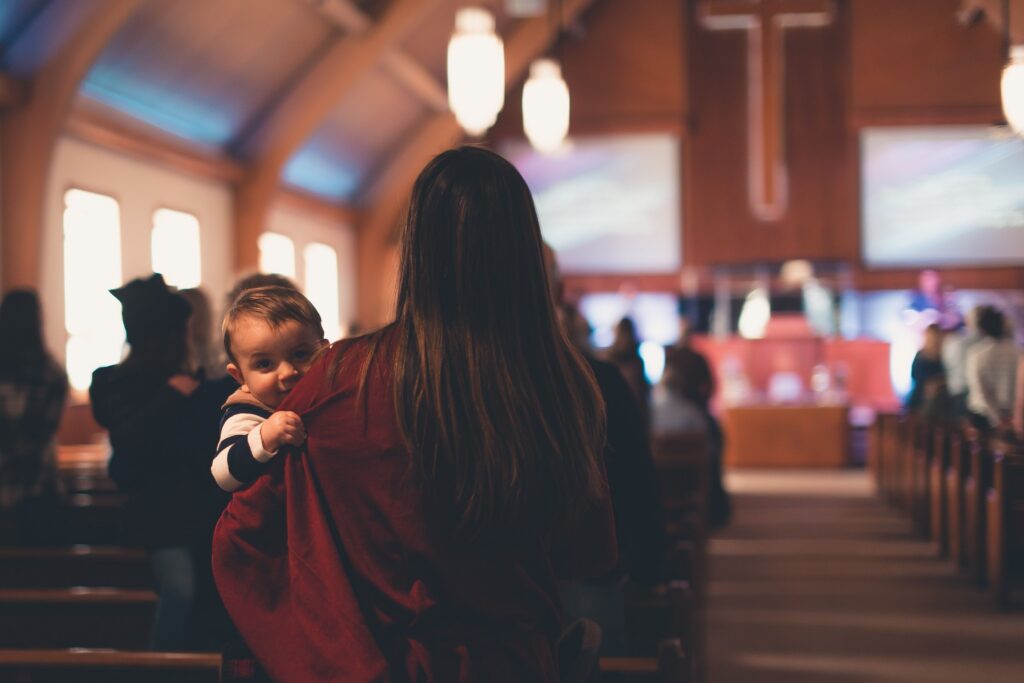 Congregant entering church